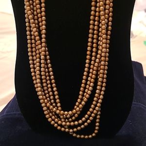 Very  Long Triple Stranded Goldtone Necklace